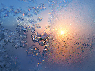 Image showing Ice pattern and sunlight on winter glass
