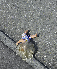 Image showing doll on the street