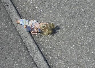 Image showing doll on the street