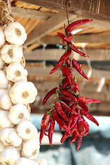 Image showing Dried red pepper and garlic, country market