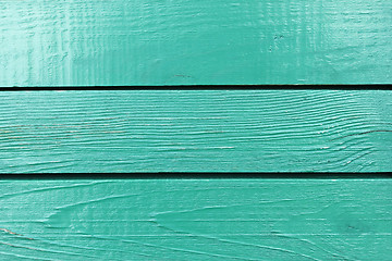 Image showing Fragment of wooden turquoise fence