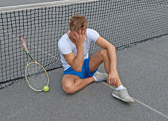 Image showing Lost game. Disappointed tennis player.