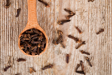 Image showing cloves in wooden spoon