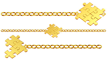 Image showing Set of shiny gold chains with puzzles