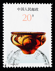 Image showing Stamp printed in China shows Chinese ancient color pottery