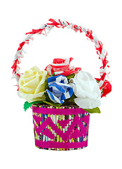 Image showing Artificial paper roses in basket isolated on white 