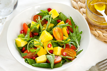 Image showing Mango with Pomegranate and rocket salad