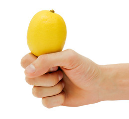 Image showing man's hand holding a lemon