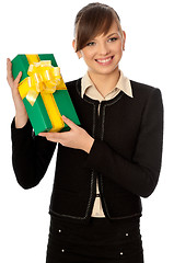 Image showing green box with yellow bow as a gift