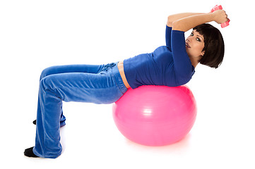 Image showing Exercises with dumbbells on a gymnastic ball