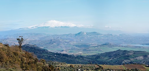 Image showing Sicilian rural landscape in winter with snow peak of Etna volcano in Italy