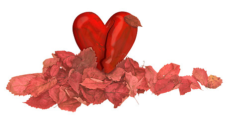 Image showing heart in the pile of autumn red leaves