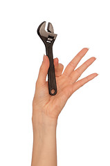 Image showing small adjustable spanner in the hand