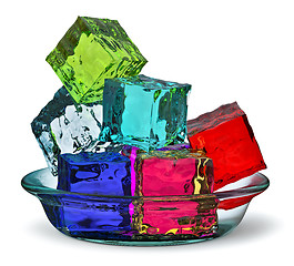 Image showing Different colored cube jellies in a glass plate