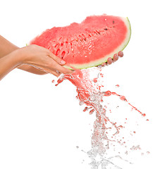 Image showing a segment of watermelon in the hands