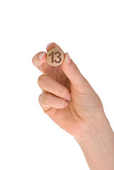 Image showing thirteenth bingo ball in the hand