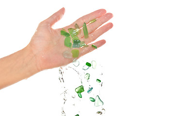 Image showing pieces of glass in the woman's hand