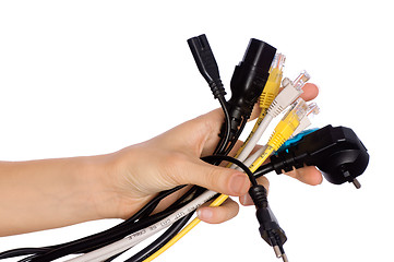 Image showing woman taking different cables in the hand