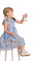Image showing laughing girl drinking a glass of water