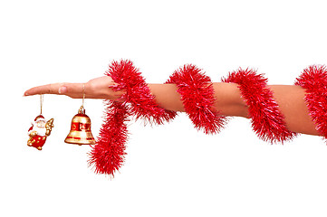 Image showing Christmas-tree bell in the hand
