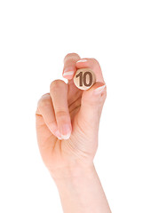 Image showing 10 bingo ball in the hand