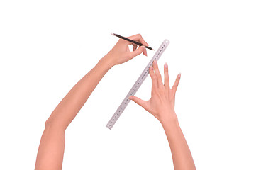 Image showing woman draws line with rule and pencil