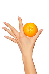 Image showing woman holding yellow sweet fruit tangerine