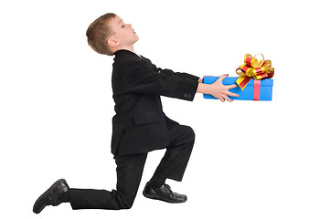 Image showing boy presenting a gift for his little love