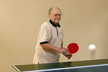 Image showing Grandfather playing ping pong