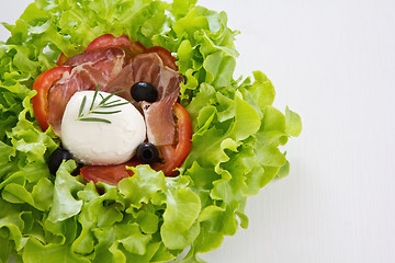 Image showing Prosciutto with Mozzarella and lettuce salad