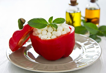 Image showing Pearl mozzarella with basil in pepper