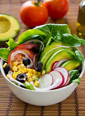 Image showing Avocado with sweetcorn and olive salad