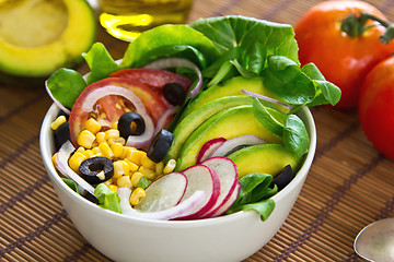 Image showing Avocado with sweetcorn and olive salad