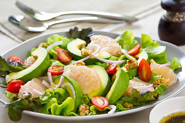 Image showing Avocado with Grapefruit and walnut salad