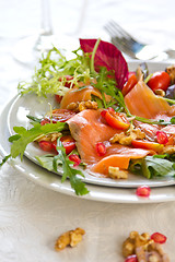 Image showing Smoked salmon with pomegranate and walnut salad