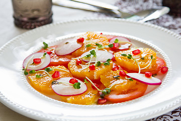 Image showing Orange with pomegranate and radish salad