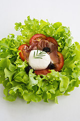 Image showing Prosciutto with Mozzarella and lettuce salad