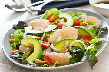 Image showing Avocado with Grapefruit and walnut salad