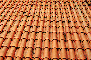 Image showing Background of clay round tiles covered roof 