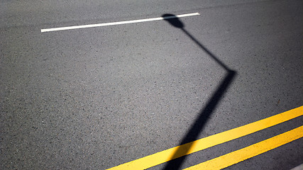 Image showing streetlight shadow on road