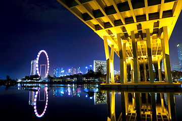 Image showing Singapore skyline at night with Bridge