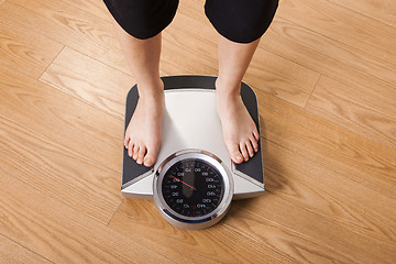 Image showing Measuring weight