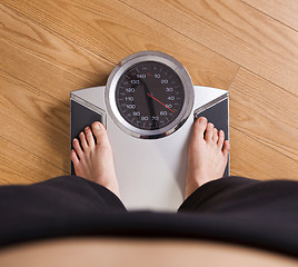 Image showing Measuring weight