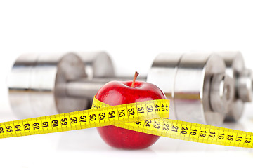 Image showing Dumbbells with an apple