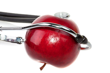 Image showing Stethoscope and apple