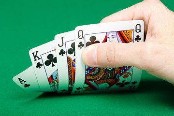 Image showing man's hand with four cards