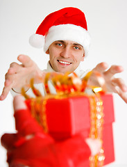 Image showing young man in a Santa hat