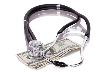 Image showing stethoscope on dollars