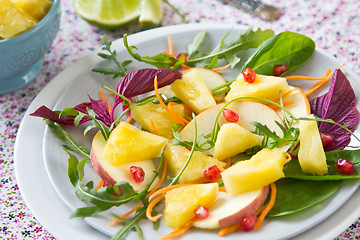 Image showing Pineapple with pomegranate and spinach salad