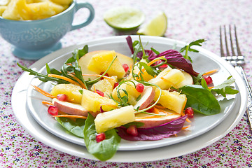 Image showing Pineapple with pomegranate and spinach salad